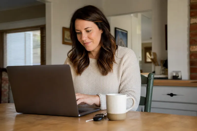 Homeowner filling out a short form about her house